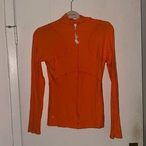 Lululemon size 8 top orange never worn